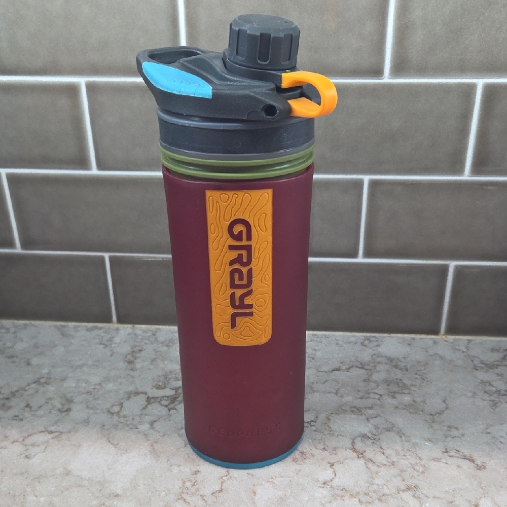 Grayl Water Bottle With Filter in Burgundy with Orange Accent